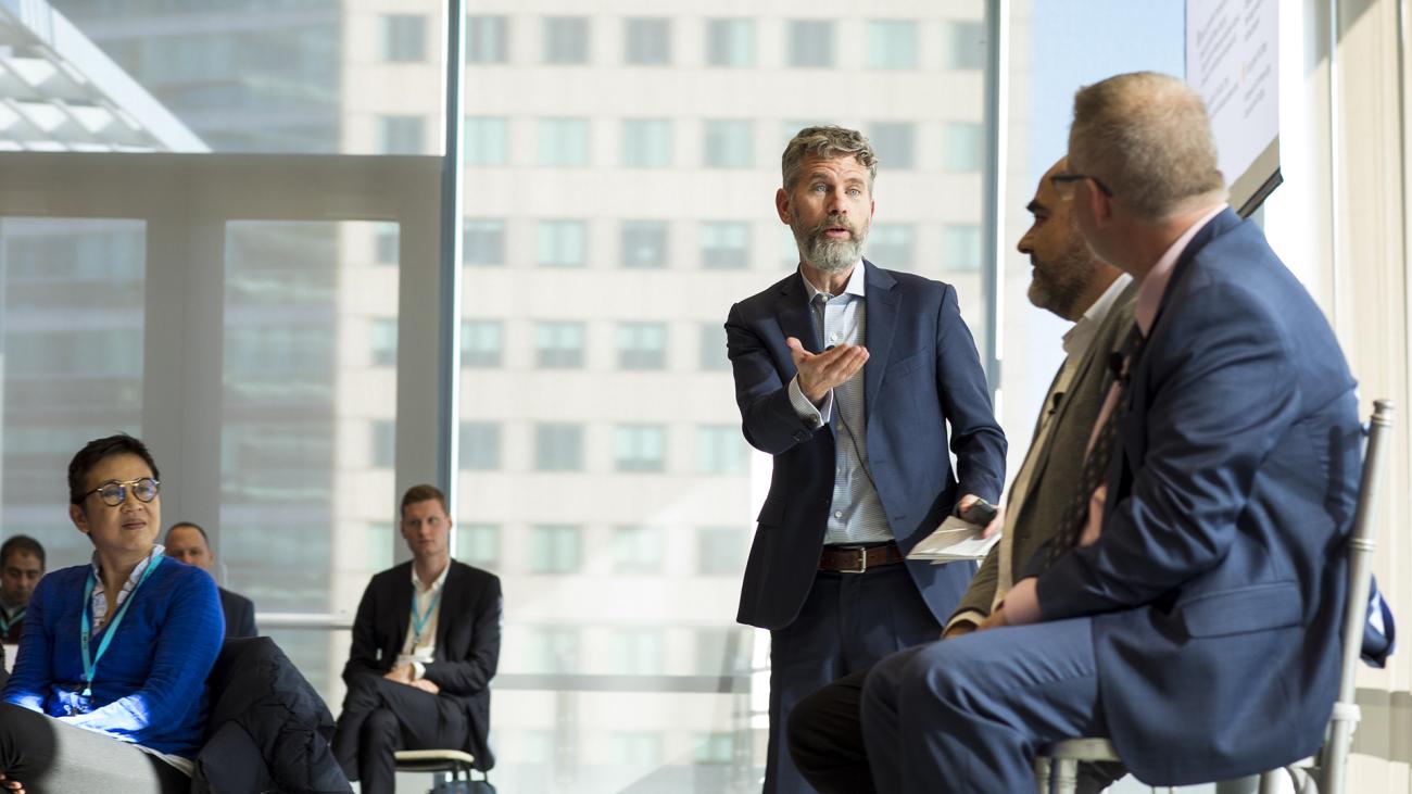 Nils Fonstad moderates a panel at the 2022 MIT CISR Annual Research Forum.