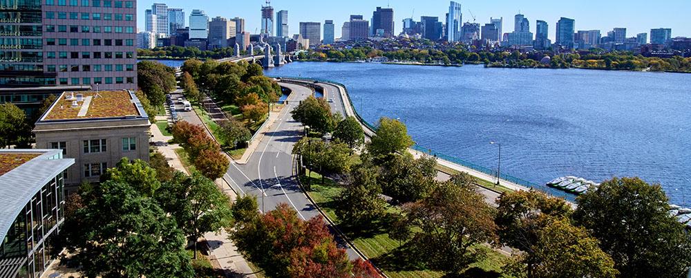 The Boston skyline stretches to the right across the Charles River in this aerial view over the MIT Sloan School of Management. 